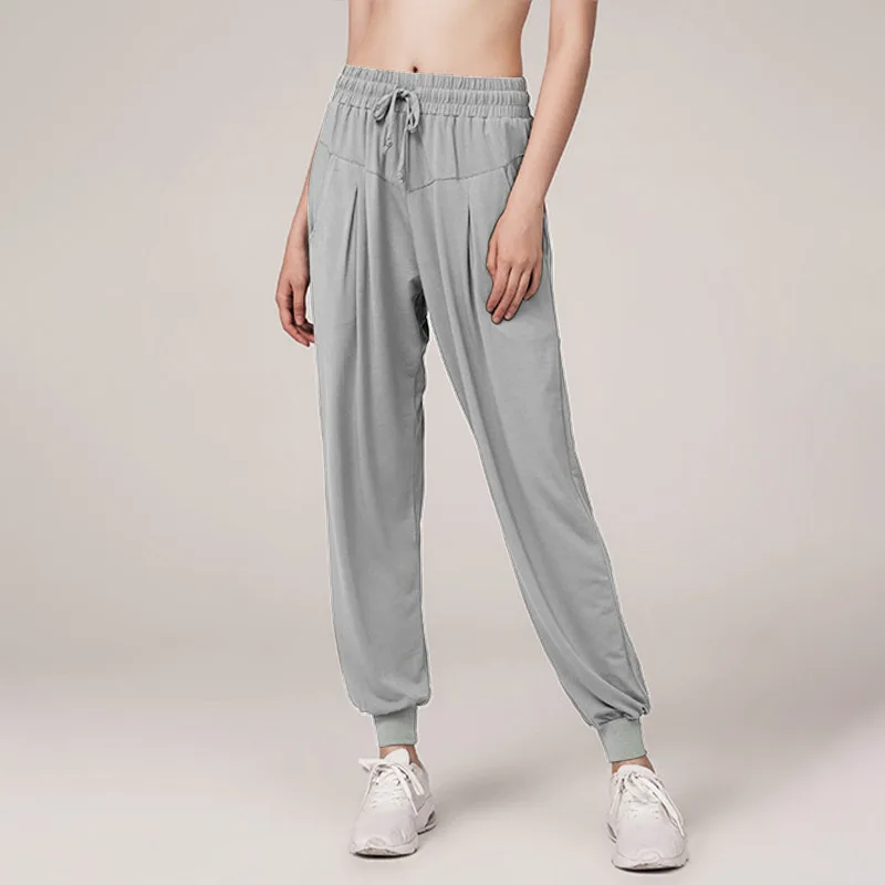 

Lulu ladies wholesale sports pants European and American pure colornylon blendedloosepants breathable jogging fitness yoga pants
