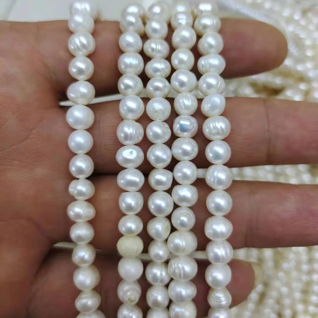 

5-6 mm near round nature pearl loose wholesale nature freshwater pearl in strand A grade