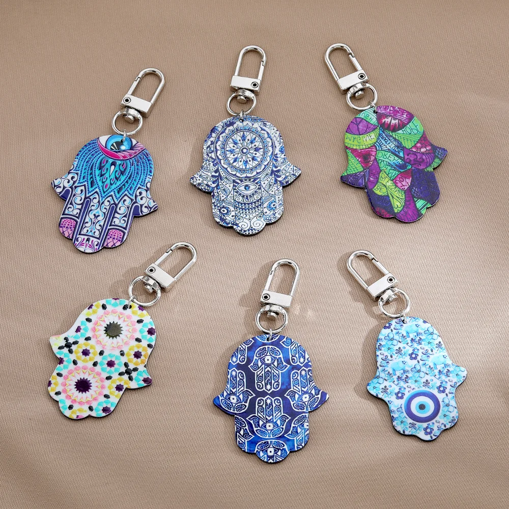 

Wholesale Bohemian Colored Hand Of Fatima Keychain Acrylic Blue Flower Pattern Key Ring For Bag