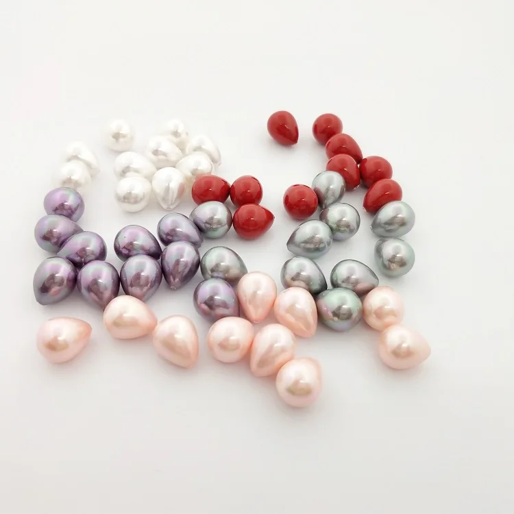 

Natural Half a hole shaped shell pearl with 12x15mm Oval Pearl