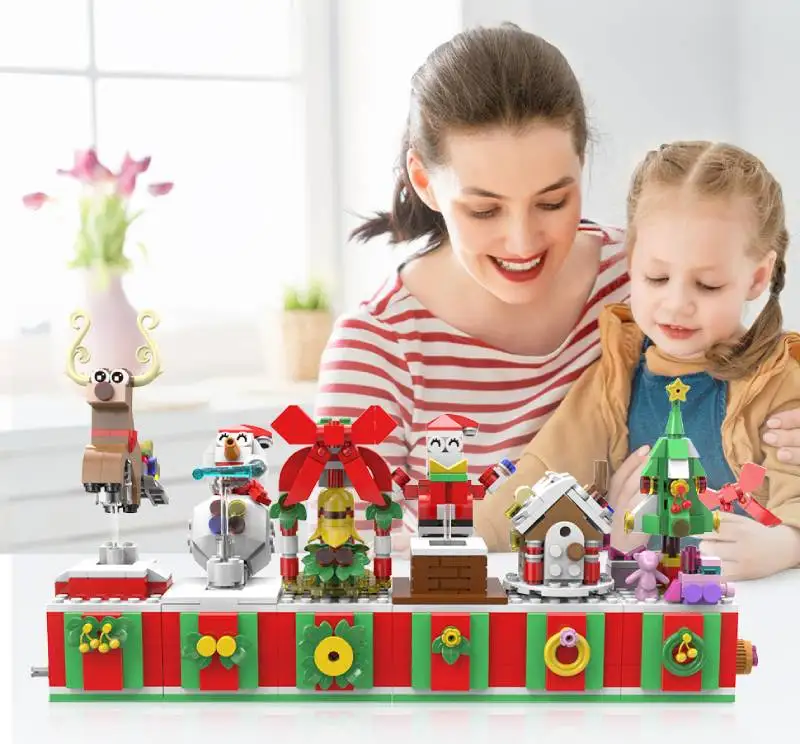 

2023 New Christmas House Building Blocks Sets Christmas Father Swing Reindeer Snowman Trees Wind Up Music DIY Mini Brick Sets