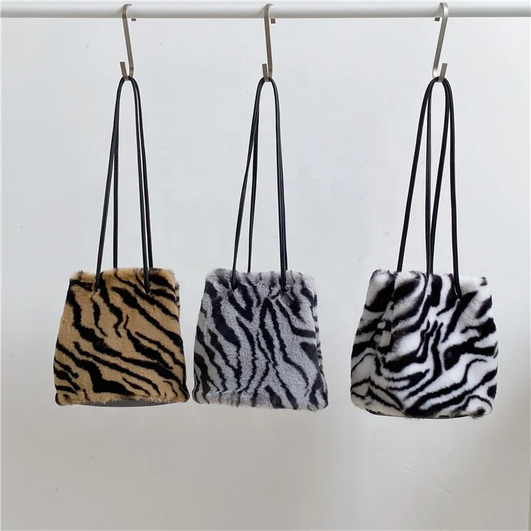 

Winter women's fashion handbags cross body trend creative zebra print shoulder bag soft leopard print splicing bucket plush bag