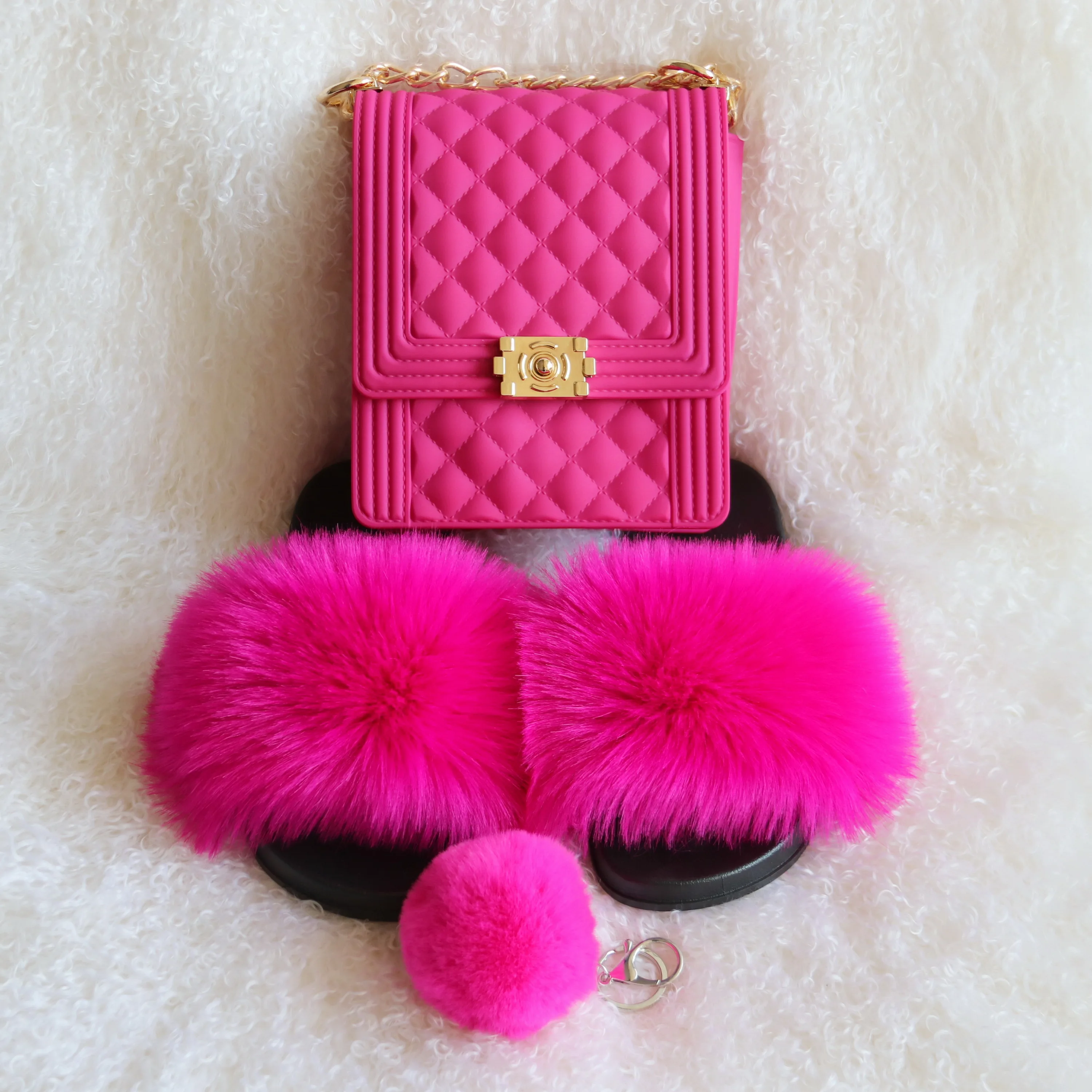 

hot pink faux fur slides with matching jelly handbag