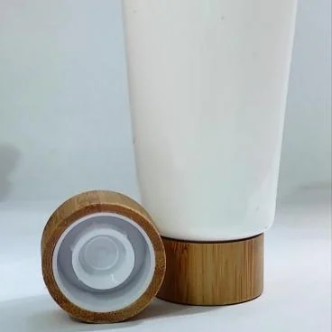 

Collapsible tube 60g: Black matt plastic with bamboo lid