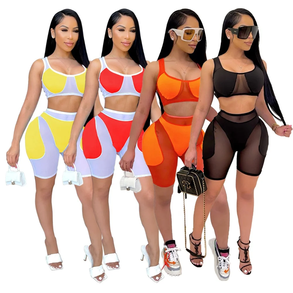 

KX-1140 Best selling solid hollow out mesh shorts set patchwork crop top two piece shorts set women