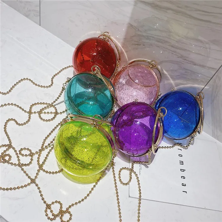 

The new 2021 has a small round bag with transparent chain shoulder and cross-body for women with circular rings, Yellow, red, purple, green, blue, pink