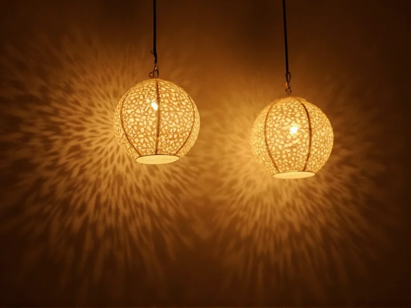 DIY paper lanterns casting patterned shadows on wall