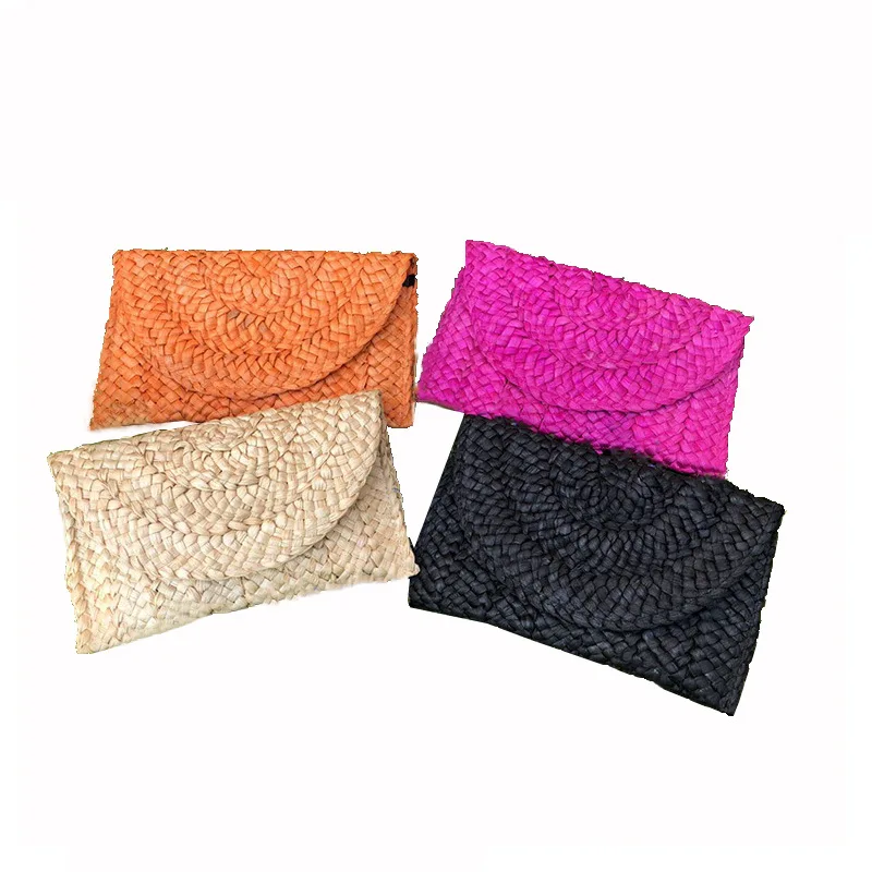 

fashional woven solid color straw hand bags 2021 hot selling ladies clutch summer handbags