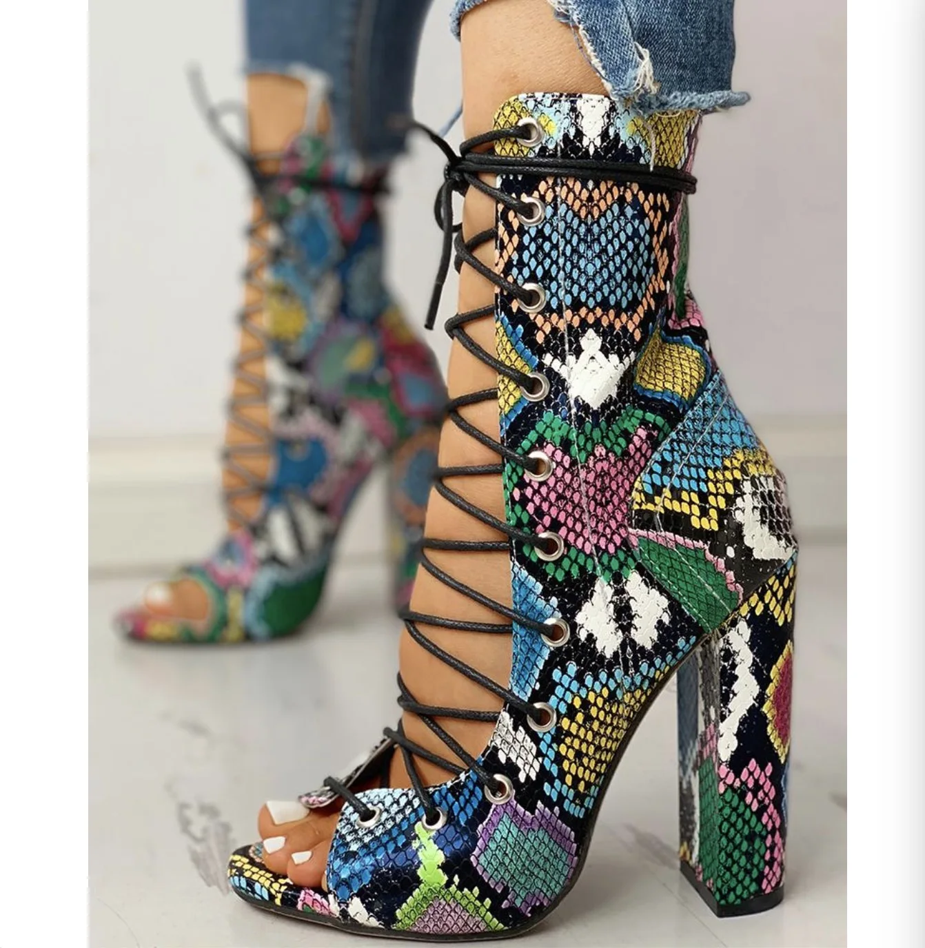 

Hot selling Bohemian style women's shoes snakeskin grain individual character thick boots thin belt high heels for women