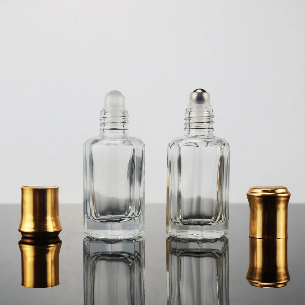 

Empty octagonal glass bottle of attar perfume oil with glass roller bottle 3ml 6ml 12ml with gold cap