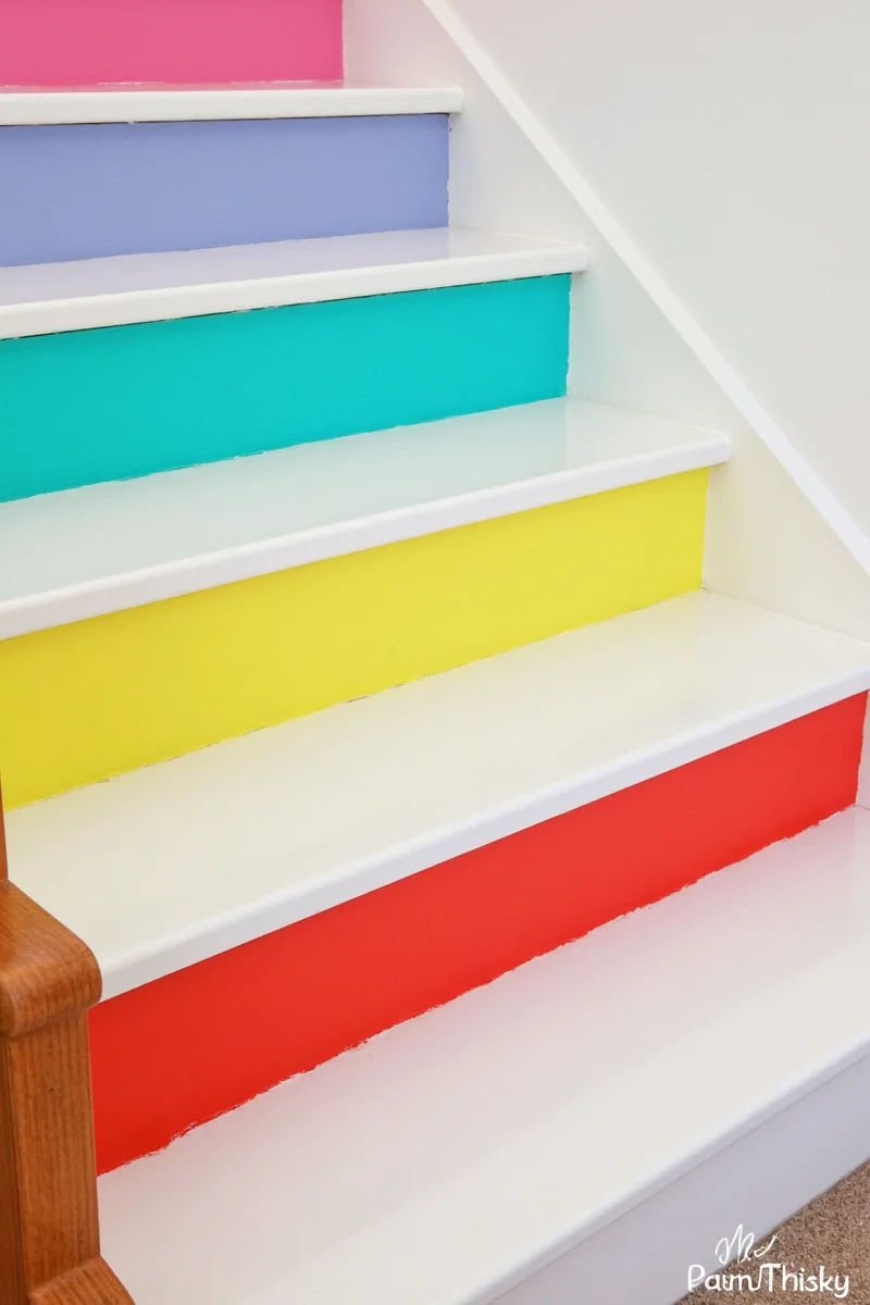 Ombre painted stairs in coral tones