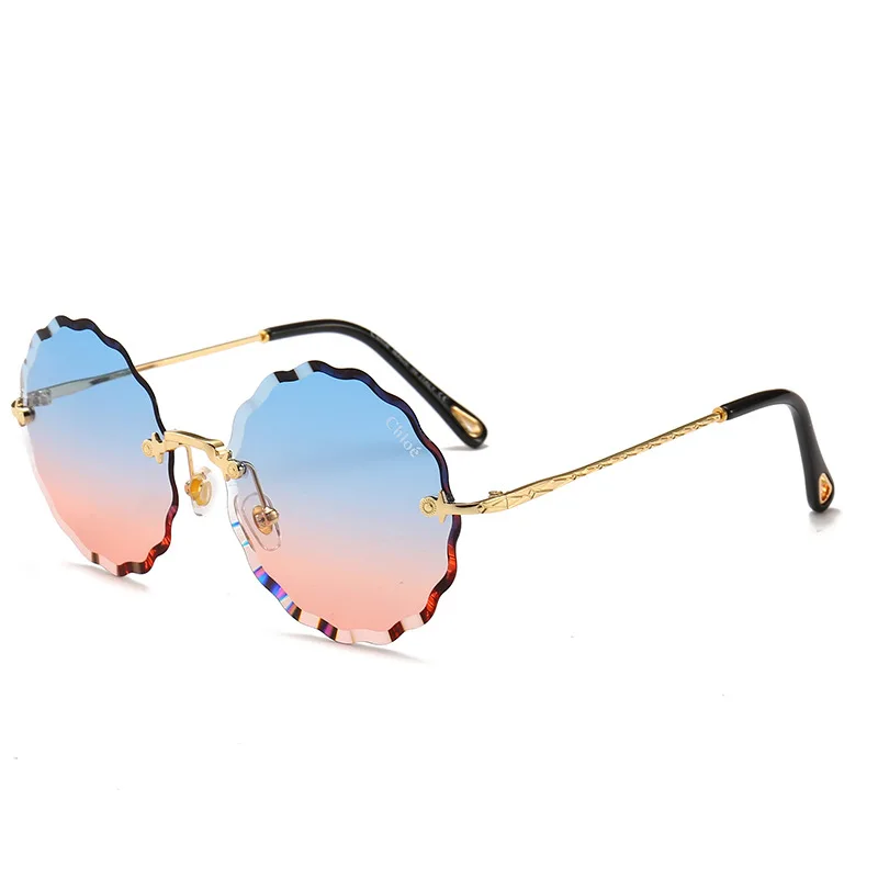 

Frameless Flower Wave Trimming Women Sunglasses 2020 Italian New Street Snap Ocean Lens Metal Sun Glasses Lentes Sol Mujer