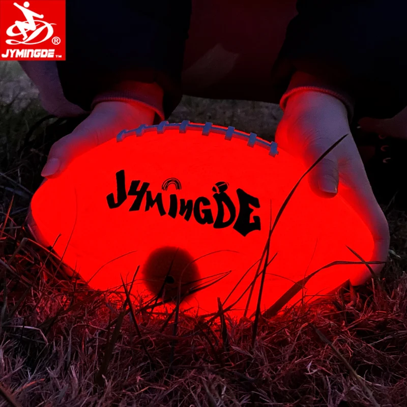 

Luminous glow in the dark two high bright LED football ball lights rubber light up custom American football, Orange