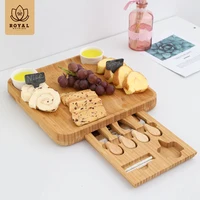 

Cheese Board and Cutlery Set with includes 2 slate labels and chalk Bamboo Charcuterie Platter and Serving Tray for Wine