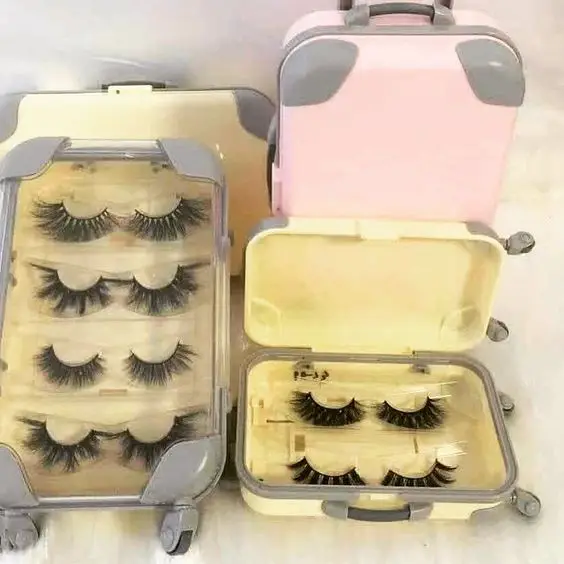 

Own brand thick artificial mink eyelashes packed with suitcase