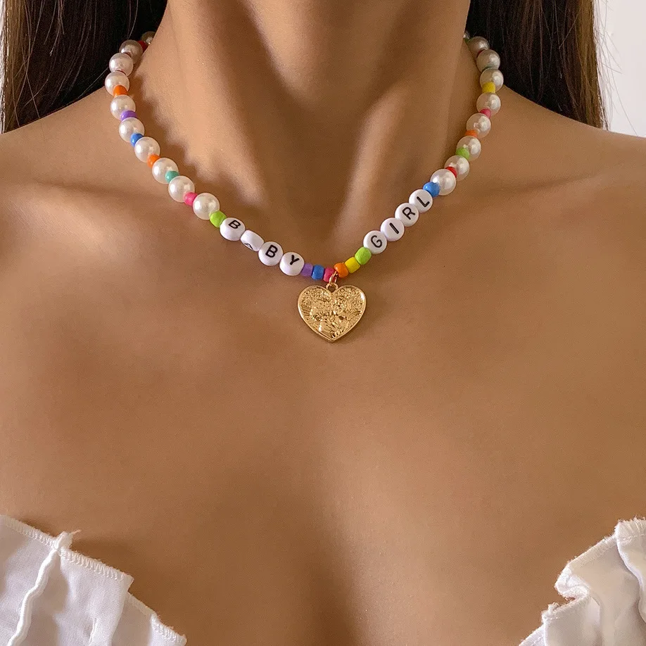 

Hot Summer Imitation Pearls Colorful Seed Beads Chain Rice Beaded Necklace Choker Woman Boho Gold Heart Charm Bead Necklace, Picture display