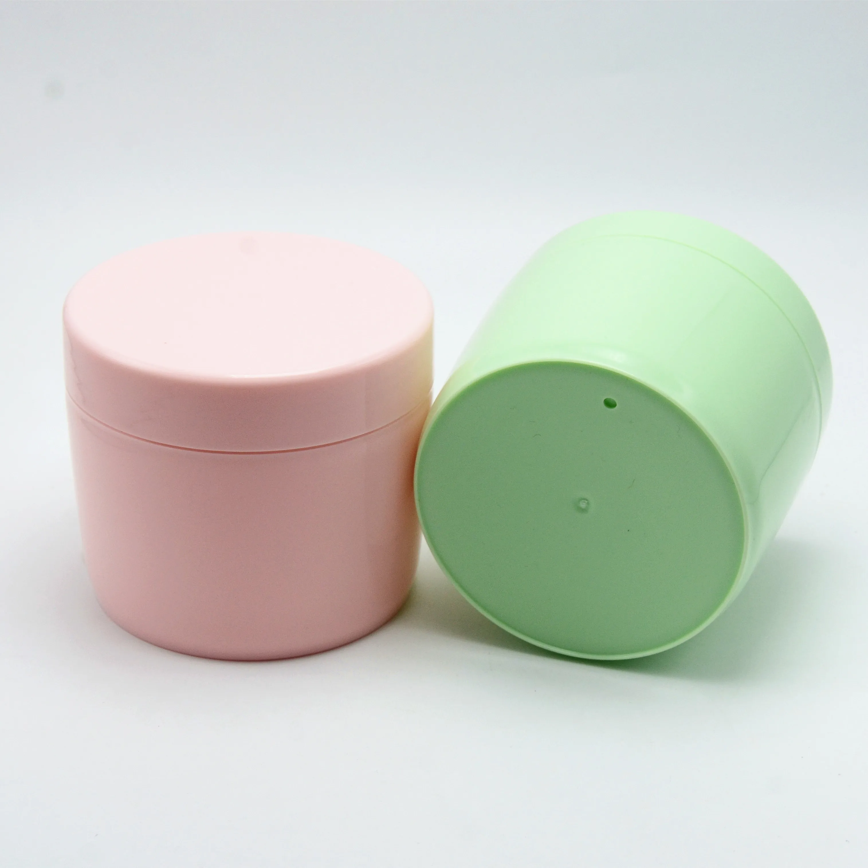 

Wholesale empty cosmetic packaging 250ml pink plastic cream jars