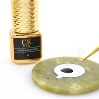 

Wholesale Custom Fast 1-2s dry gold bottle waterproof eyelash adhesive with individu extension private label eyelash glue