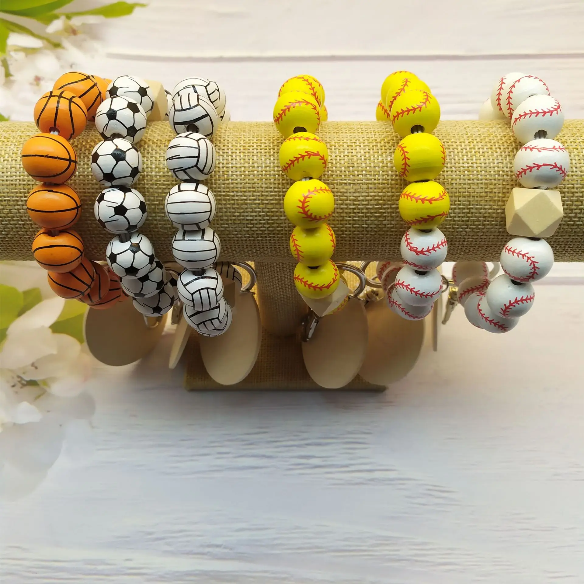 

2022 New football basketball baseball softball wood bead printed flower bracelet keychain
