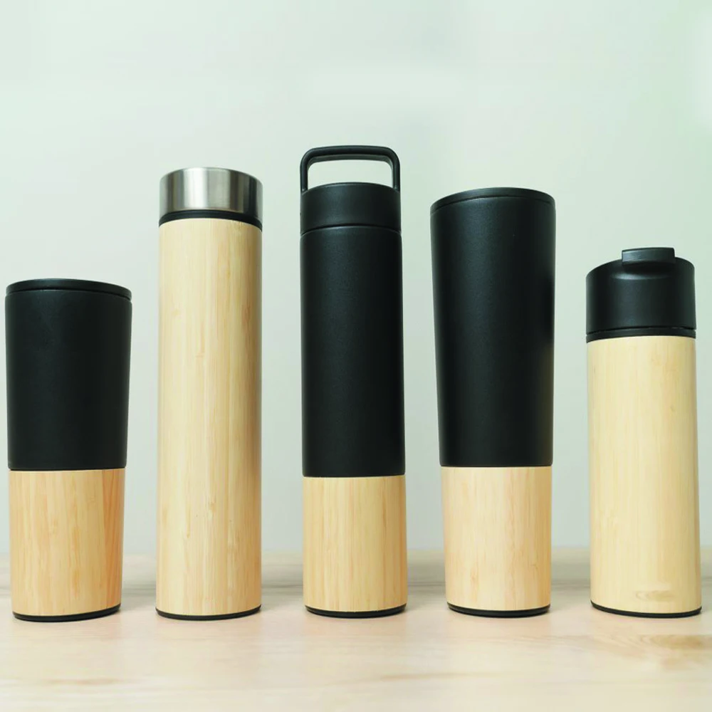 

CNG771 700ML New design custom glass water bottle with bamboo lid bamboo sleeve for cool water, Transparent