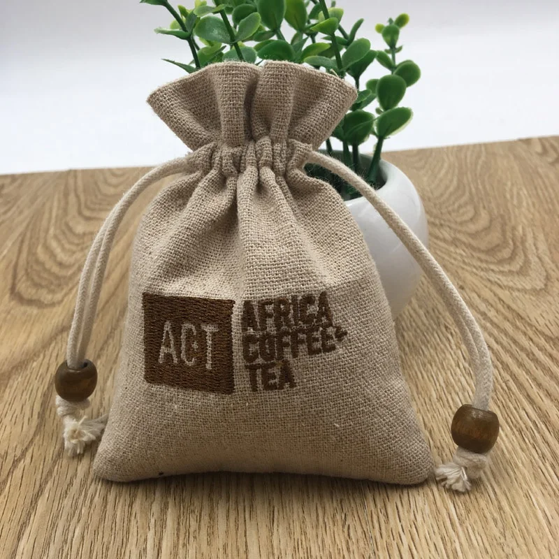 

Embroidery Logo Jute Drawstring Bag For Coffee Tea, Natural color, off white color, white color, black color , red etc