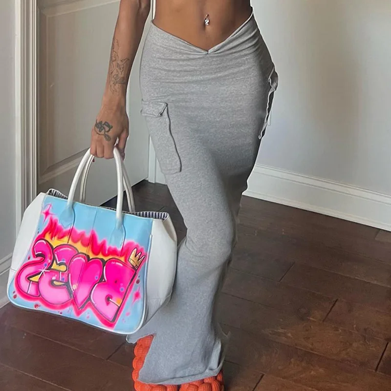 

2022 New Arrival Wholesale Girls' Skirts Low Waist Side Pocket Solid Color Pocket Bodycon Pencil Maxi Long Skirt