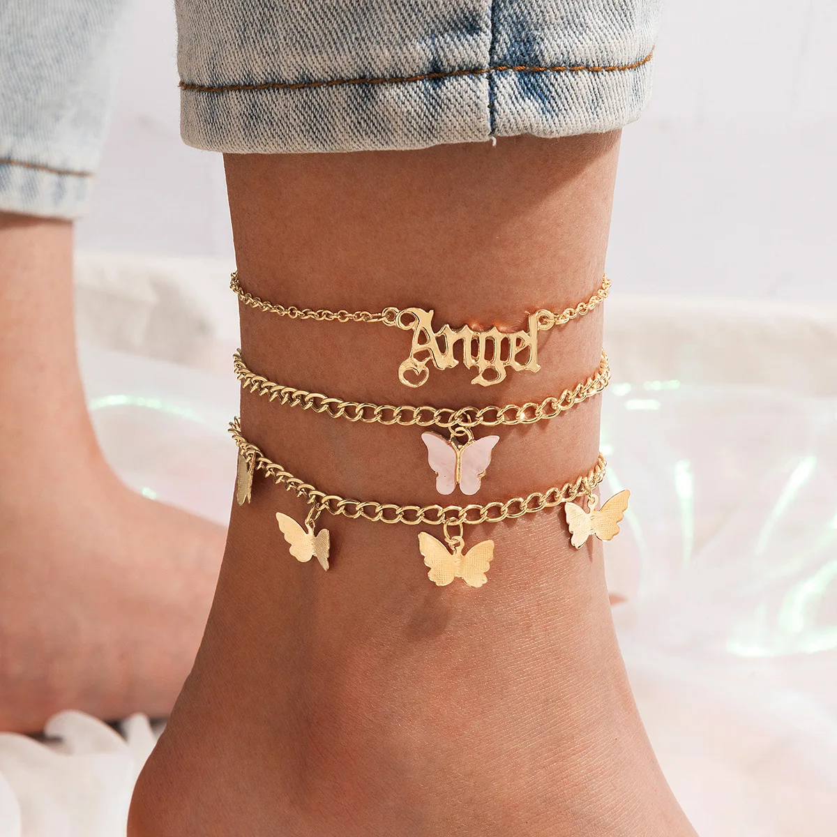 

Dvacaman Designer Gold Plated Women Foot Chain Letter Angel Pink Butterfly 3 Pieces Set Beach Chain Anklets Bracelets Jewelry