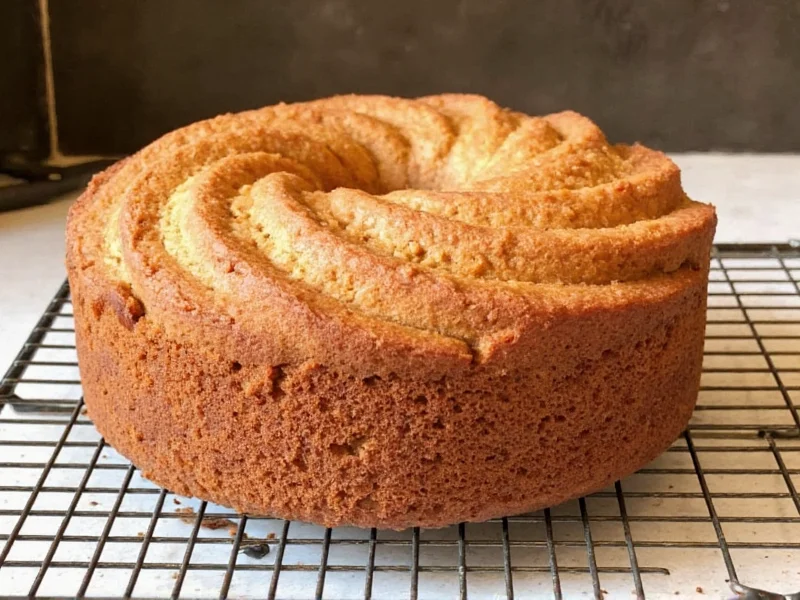 Perfectly baked cake cooling on wire rack
