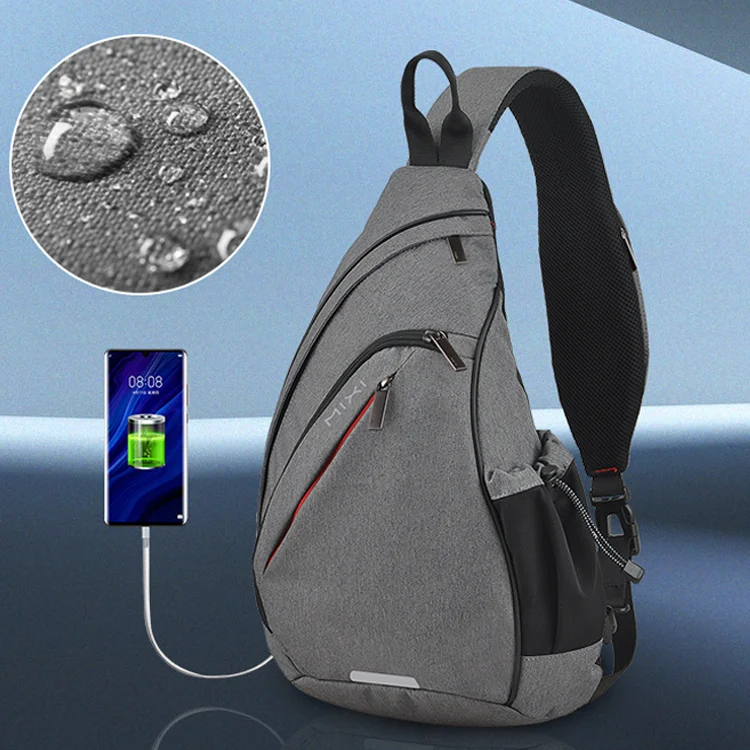 

Wholesale men sling one shoulder bag boy travel usb charging chest bag crossbody bags chest
