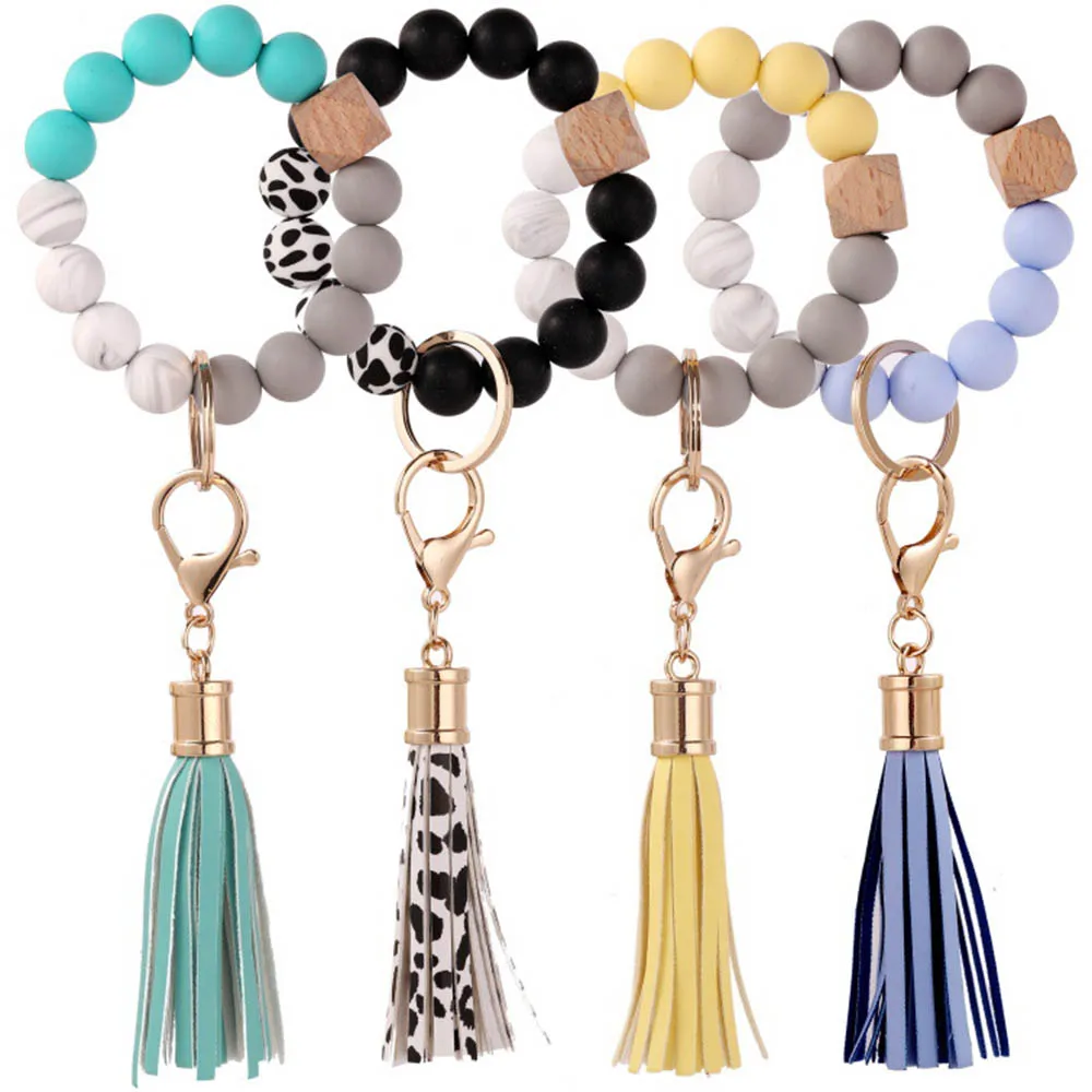 

Tassel Silicone Beads Wooden Beads Bracelet Keychain Bangle Wristlet Key Ring For Women Wrist Keychain Rings Round Wrist Bangles