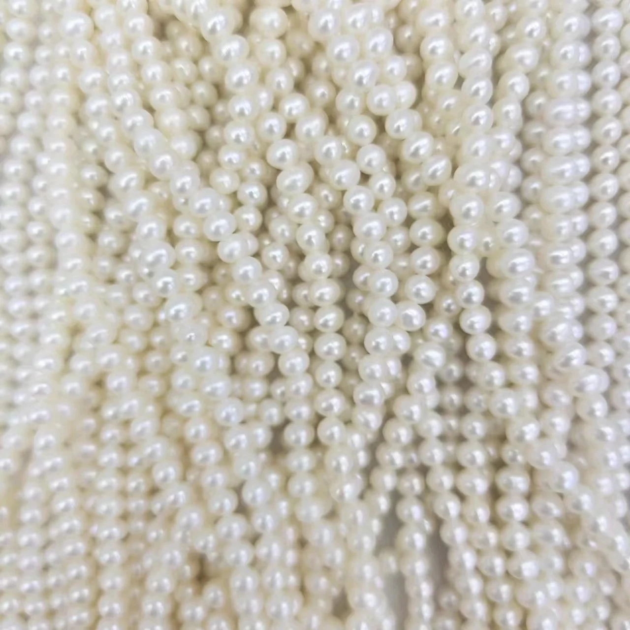 

4-4.5 mm mini near round shape nature freshwater pearl grade AAA loose in strand wholesale freshwater pearl strand