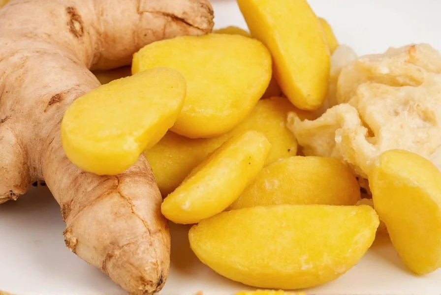 Ginger tea preparation showing sliced ginger in clear teapot with steam rising