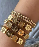 

2020 Fashion Latest Gold Charm Bracelet with Number Heart Letter Moon Snowflake Eye Pattern Copper Micro Diamond For Women