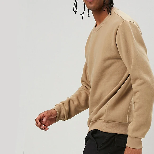 cream and brown sweatshirt