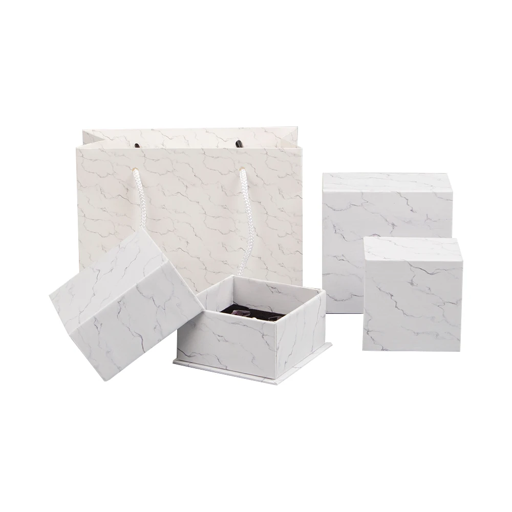 

Wholesale Luxury Fancy Custom Cardboard Hard Paper Jewelry Box with Foam Ring Jewelry Set Gift Box, White