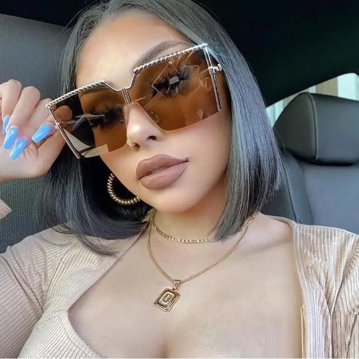 

2021 new large frame metal pattern Sunglasses Women's fashion half frame ocean piece Sunglasses