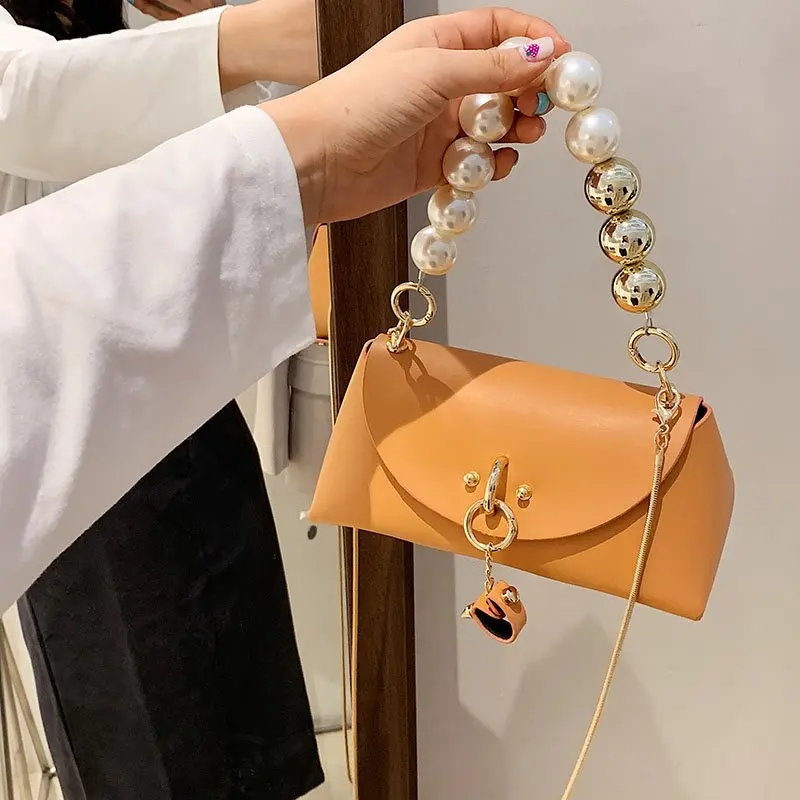 

New factory wholesale pearl chain hand bags girls small cute bags 2022 hot sell chain purses for females