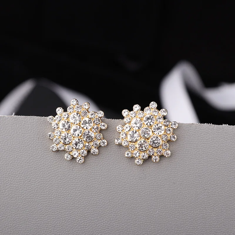 

Luxury snowflake earrings 2022 Korean style full diamond glittering gold plated earrings, Picture shows