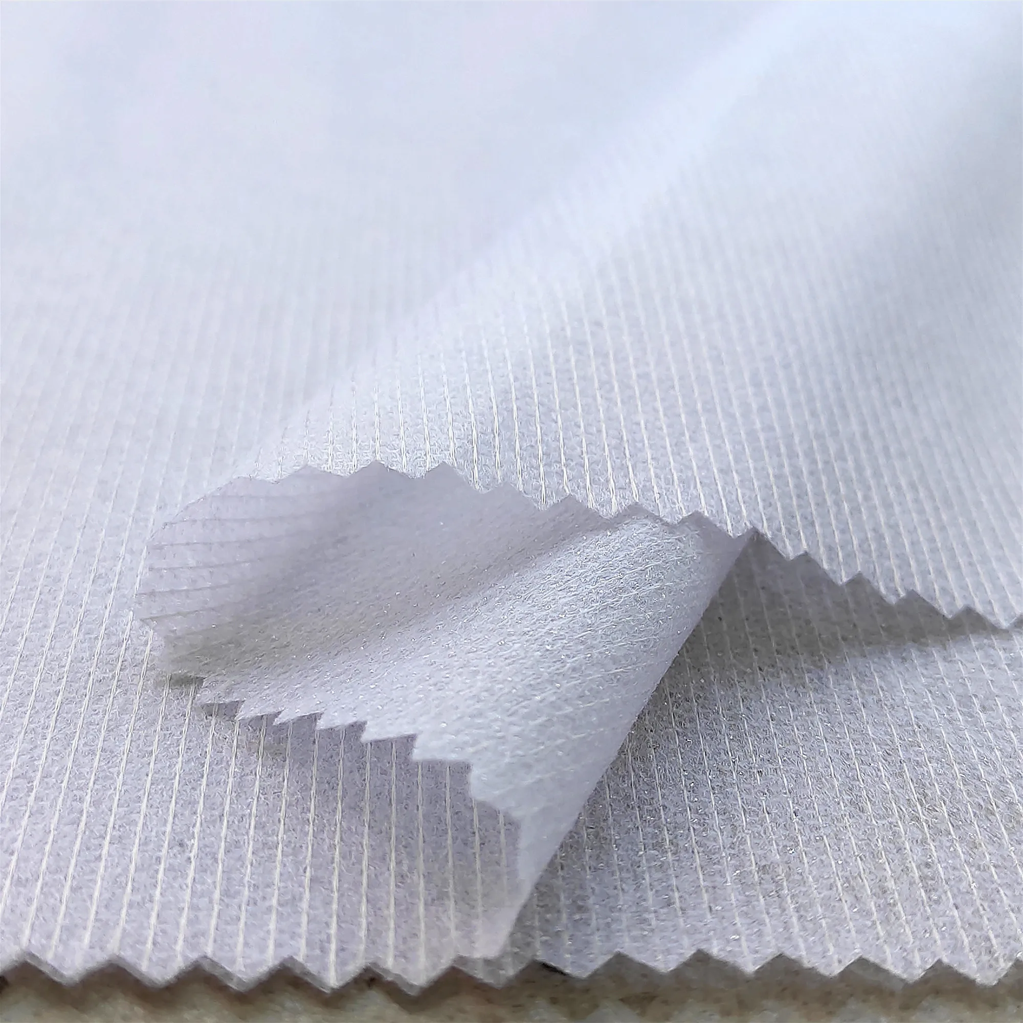 100% 涤纶无纺布易熔线迹粘合衬布 