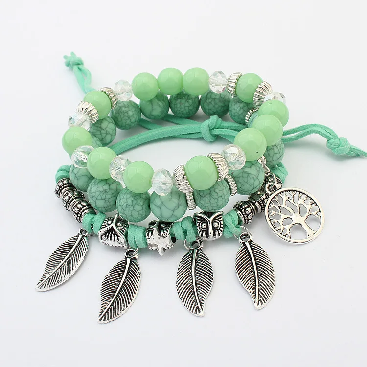 

Ruigang Retro Design Adjustable Green Seed Bead Tree of Life Bracelets Set Multilayered Natural Stone Feather Bracelet For Women