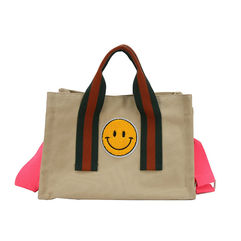 

Hot sell 2022 New Canvas bag women single shoulder New cute smiley bag large-capacity shoulder handbags for women, Multi