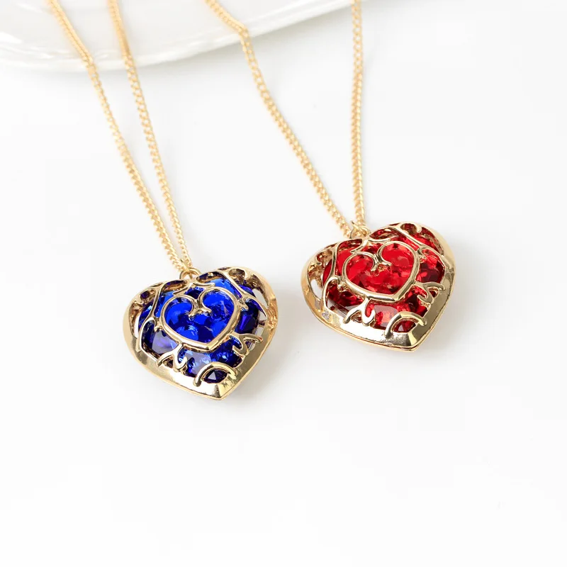 

Wholesale Anime Movie Surrounding Ornament Legend of Zelda Same Hollow Heart Crystal Necklace, Gold red blue