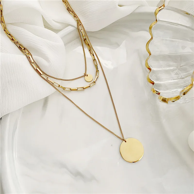 

Wholesale Engraved 18K Gold Stainless Steel Coin Custom Gold Pendant Necklace Jewelry Logo, Picture shows
