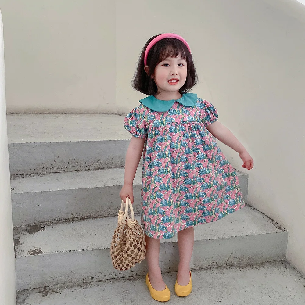 

2021 Summer New Products Girls Doll Collar Dress Girls Baby Printed Puff Sleeve Short Sleeve Dress Children's Skirt, As shown