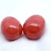 Wholesale carved polished natural red crystal healing egg for jewelry making home decoration