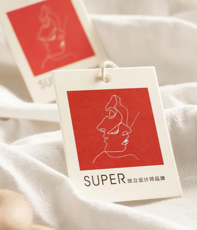 

Factory Free Logo Design Custom Brand Name Clothing Swing Tags Cheap Garment Clothes Taggs Labels Paper White Printed Shoes Tags