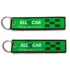 Wholesale Promotional Design Custom Brand Name Logo Fabric Embroidered Key Chain for Before Flight,keychain and key ring