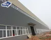 Qingdao prefabricated cement wall industrial metal frame warehouse design building