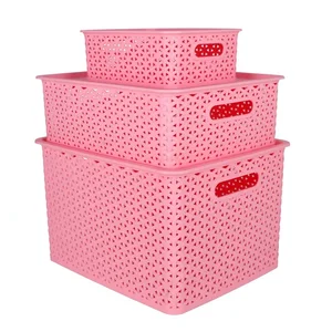 Image of small plastic stackable black plastic storage basket