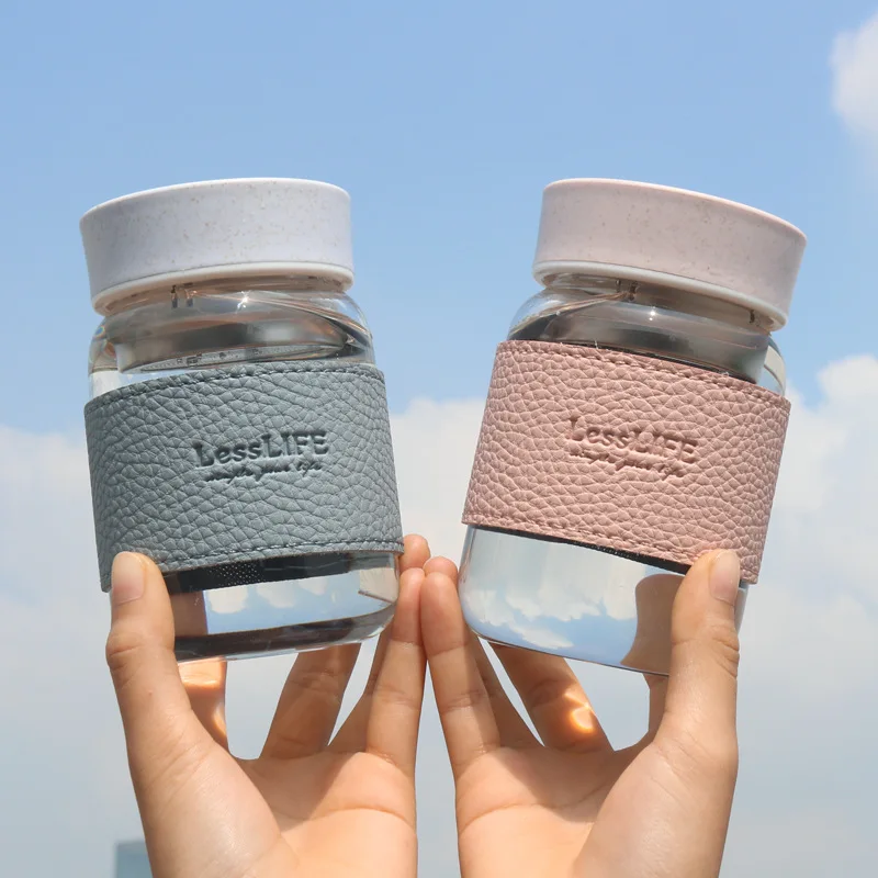 

Leather Sleeve Anti-scalding Cups Cute Mini Glass Bottle with Tea Infused, Clear